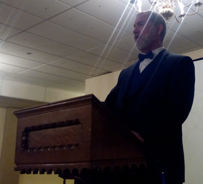 Bro. Dunning at the lectern